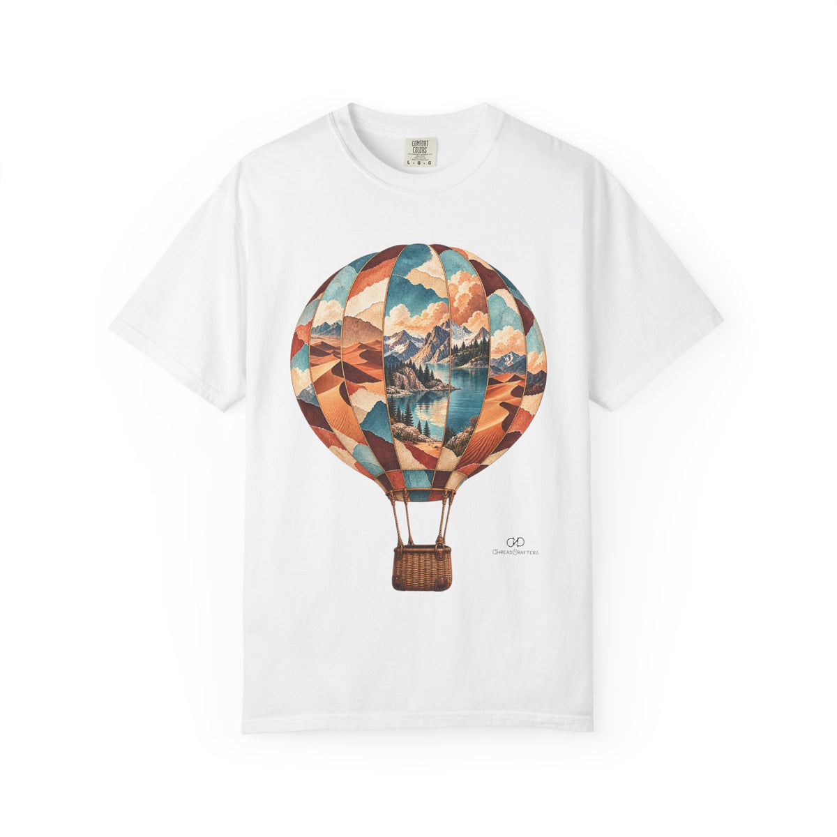 Far Horizons by ThreadCrafters — a hot-air balloon filled with mountain, lake and desert scenes, front graphic T-shirt